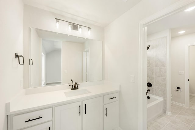 full bathroom with toilet, vanity, baseboards, shower / washtub combination, and tile patterned floors