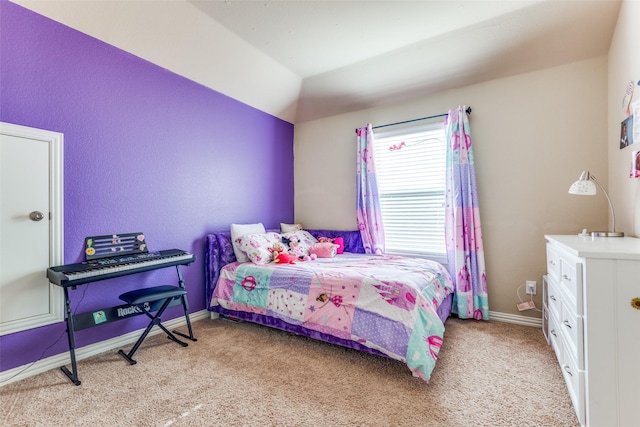 carpeted bedroom featuring vaulted ceiling