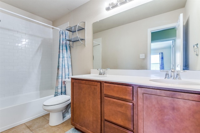 full bathroom featuring tile patterned flooring, vanity, toilet, and shower / bath combo with shower curtain