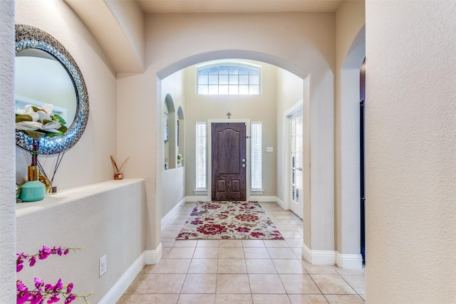 entrance foyer with light tile patterned floors