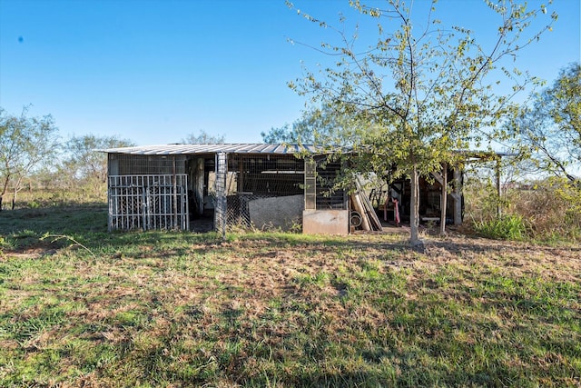 exterior space with an outbuilding