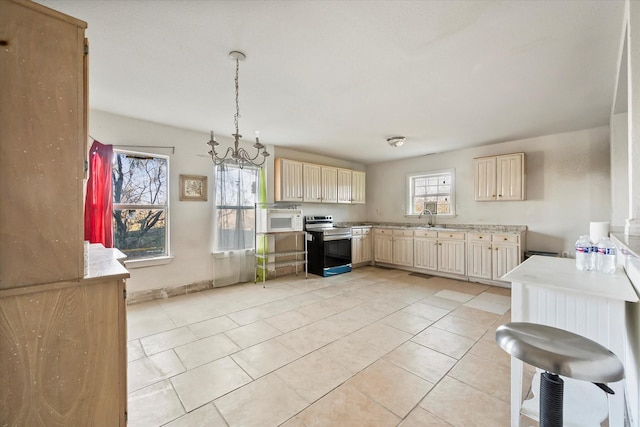 kitchen with sink, decorative light fixtures, a chandelier, stainless steel range with electric cooktop, and light tile patterned flooring