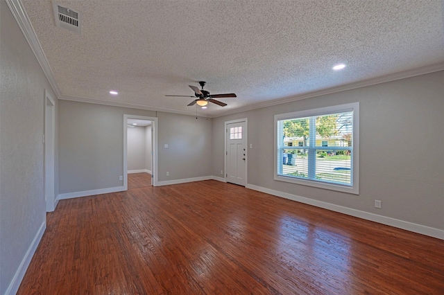 interior space featuring hardwood / wood-style floors, crown molding, and a textured ceiling