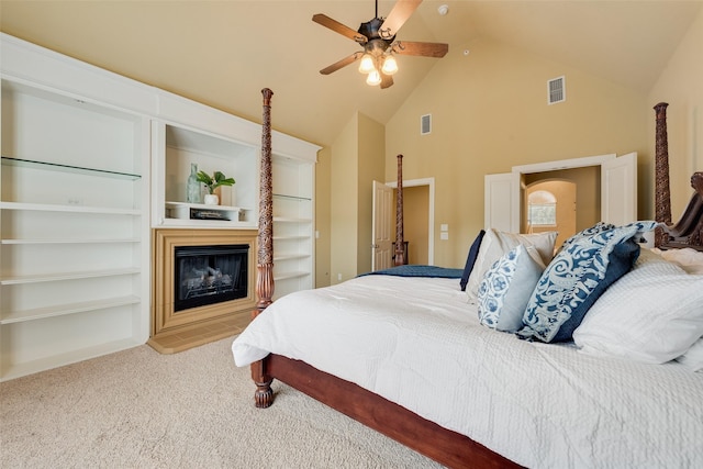 bedroom featuring carpet floors, high vaulted ceiling, and ceiling fan