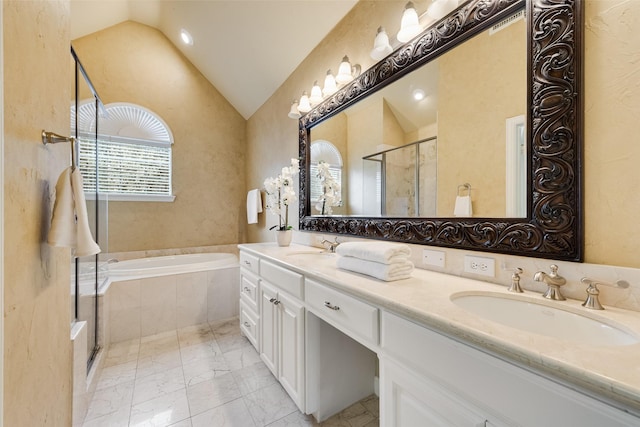 bathroom featuring vanity, plus walk in shower, and vaulted ceiling