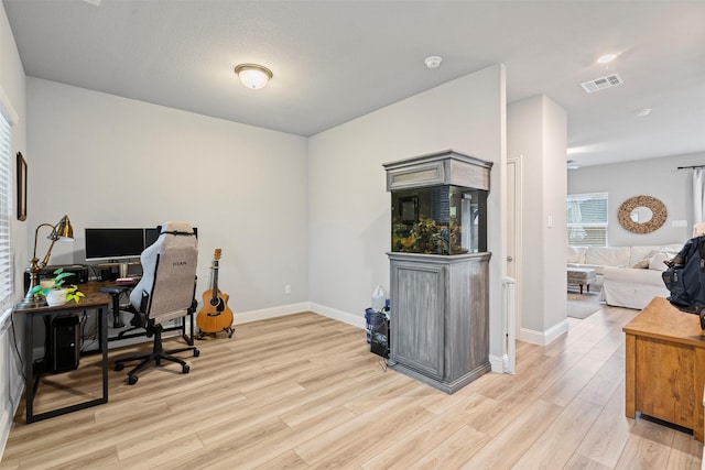 home office featuring light wood-type flooring