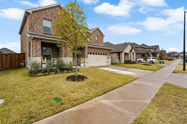 view of front of property with a front yard and a garage