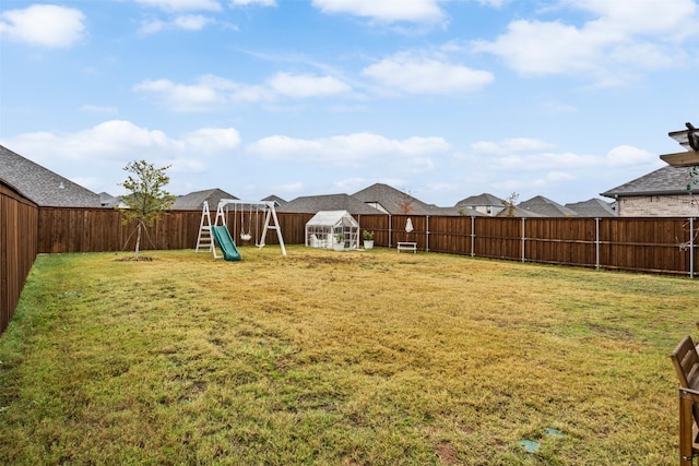 view of yard featuring a playground