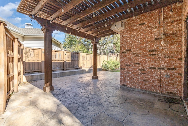 view of patio featuring a pergola