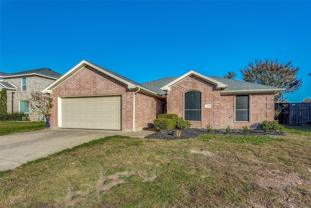 single story home with a front lawn and a garage