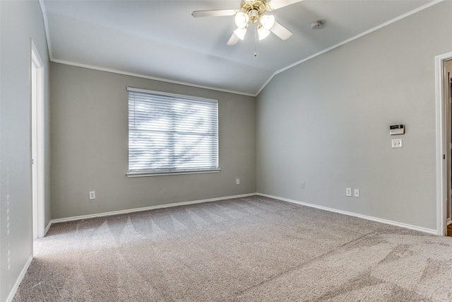 unfurnished room featuring ornamental molding, lofted ceiling, light carpet, and ceiling fan