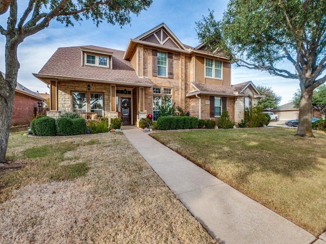 view of front of home featuring a porch and a front yard