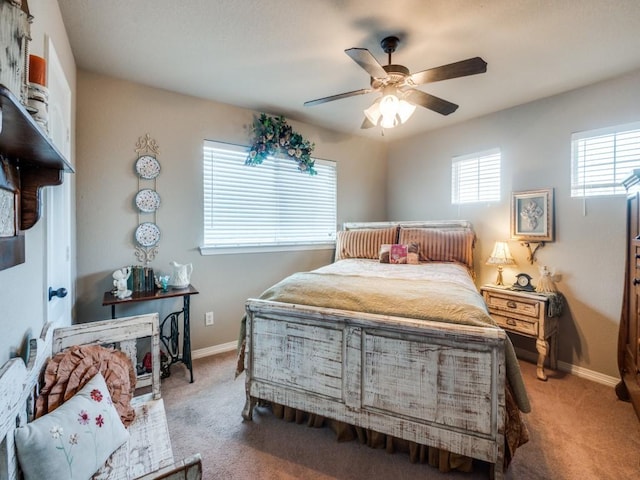 bedroom featuring ceiling fan and carpet floors