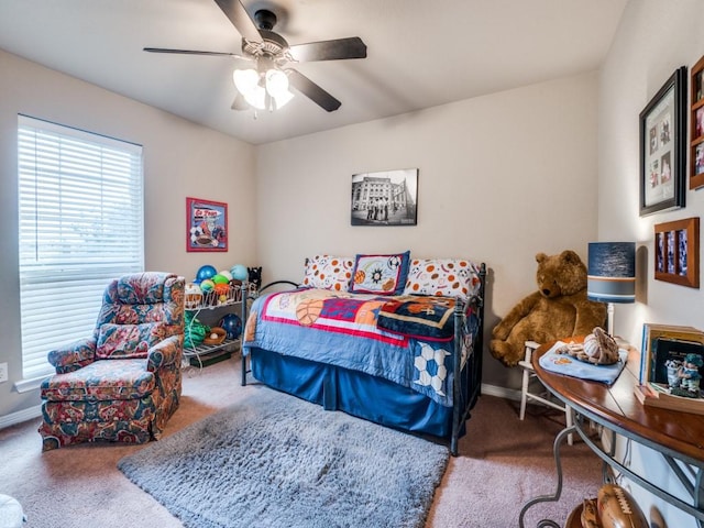 carpeted bedroom with ceiling fan