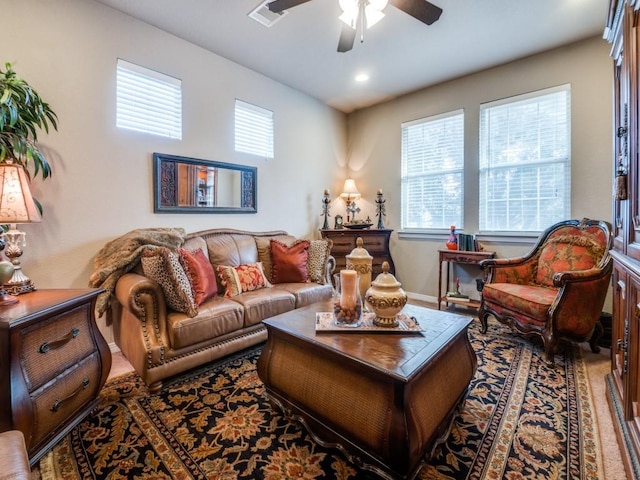 living room featuring ceiling fan