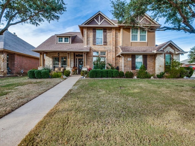 view of front of property featuring a porch and a front yard