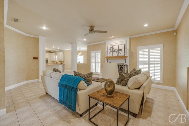 82 Bay Shore Ct, Abilene, TX 79602 - living room featuring ornate columns, crown molding, a ceiling fan, plenty of natural light, and light tile patterned floors