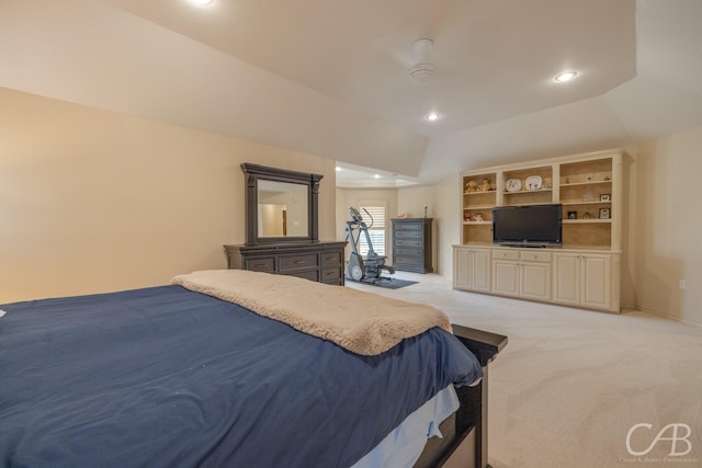 carpeted bedroom featuring ceiling fan and lofted ceiling