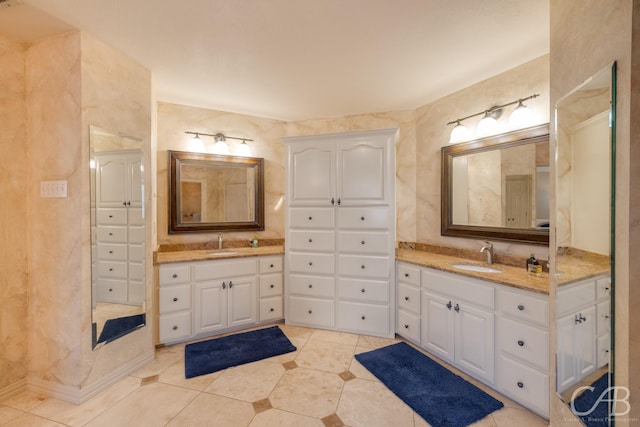 bathroom featuring tile patterned floors and vanity