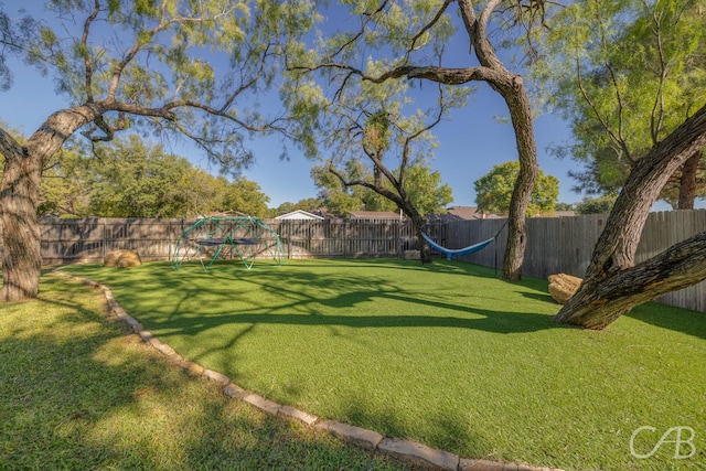 view of yard featuring a playground