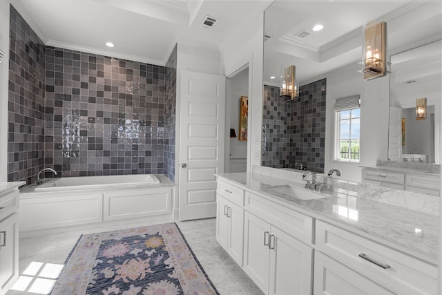 bathroom featuring vanity, a tub, and crown molding