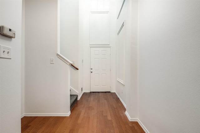 corridor featuring hardwood / wood-style flooring