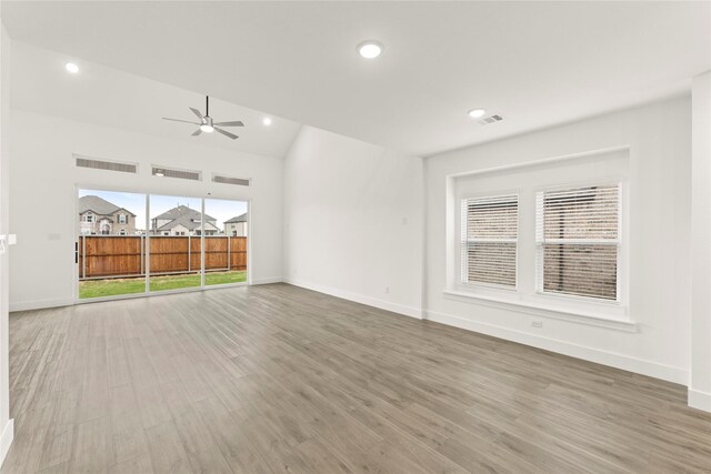 1385 Melcer St, Frisco, TX 75036 - unfurnished living room with wood finished floors, recessed lighting, ceiling fan, and visible vents