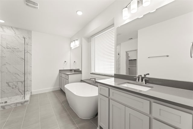 1385 Melcer St, Frisco, TX 75036 - bathroom featuring a freestanding bath, a sink, a stall shower, and visible vents