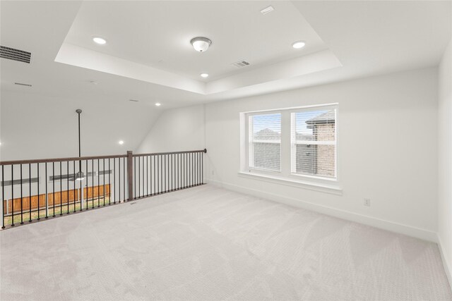 1385 Melcer St, Frisco, TX 75036 - unfurnished room featuring light carpet, visible vents, and a raised ceiling