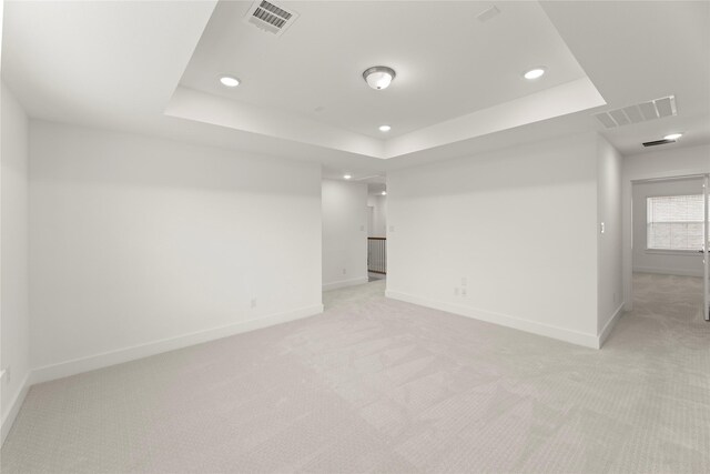 1385 Melcer St, Frisco, TX 75036 - empty room with a tray ceiling, baseboards, light colored carpet, and visible vents