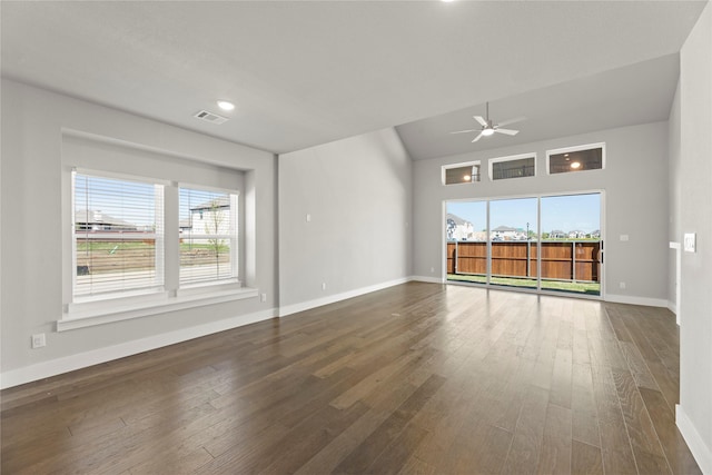 1590 Marburg Ln, Frisco, TX 75036 - spare room with a ceiling fan, dark wood finished floors, baseboards, and vaulted ceiling