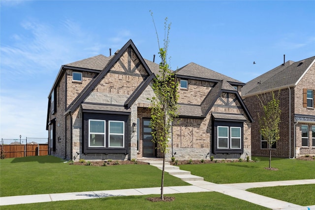 1590 Marburg Ln, Frisco, TX 75036 - tudor-style house with brick siding and a shingled roof