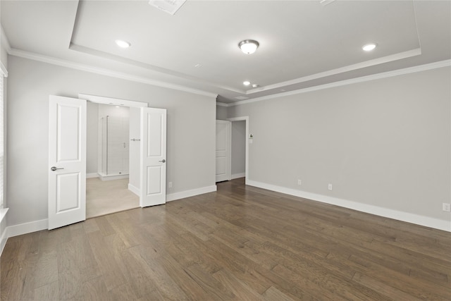 1590 Marburg Ln, Frisco, TX 75036 - empty room featuring a raised ceiling, wood finished floors, recessed lighting, crown molding, and baseboards