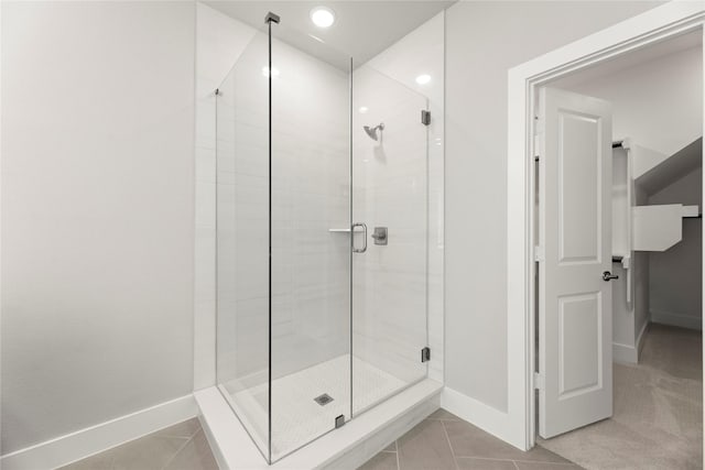 1590 Marburg Ln, Frisco, TX 75036 - bathroom with a shower stall, baseboards, tile patterned flooring, and recessed lighting