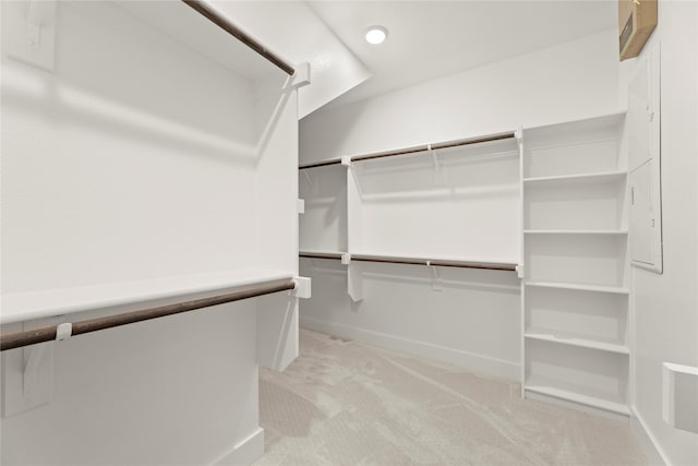 1590 Marburg Ln, Frisco, TX 75036 - walk in closet featuring light colored carpet
