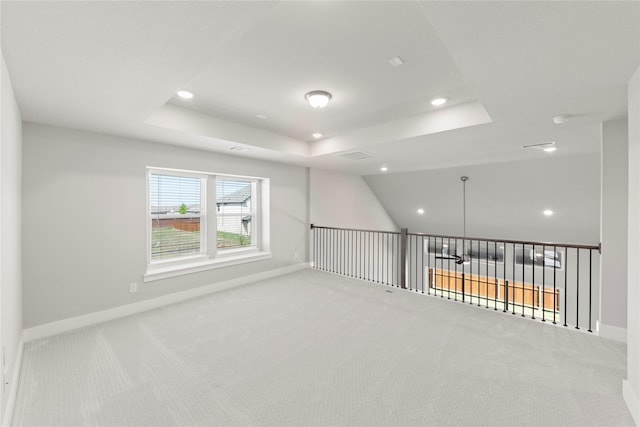 1590 Marburg Ln, Frisco, TX 75036 - carpeted empty room featuring a raised ceiling, recessed lighting, baseboards, and a smoke detector
