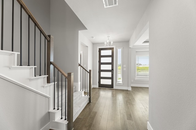 1590 Marburg Ln, Frisco, TX 75036 - entrance foyer with hardwood / wood-style floors, stairway, a chandelier, and baseboards