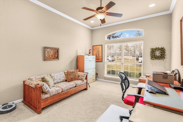 carpeted home office with ceiling fan and ornamental molding