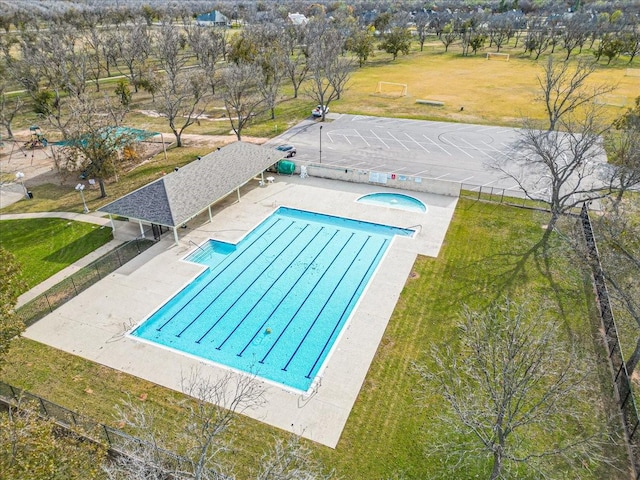 view of swimming pool with a patio