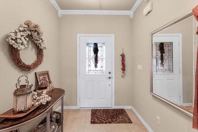 tiled entrance foyer featuring ornamental molding