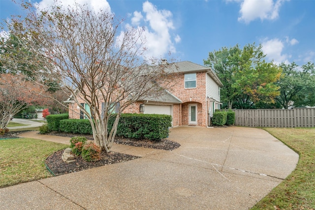 front of property with a garage