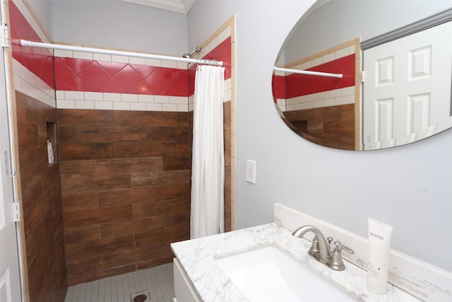 bathroom featuring vanity and curtained shower