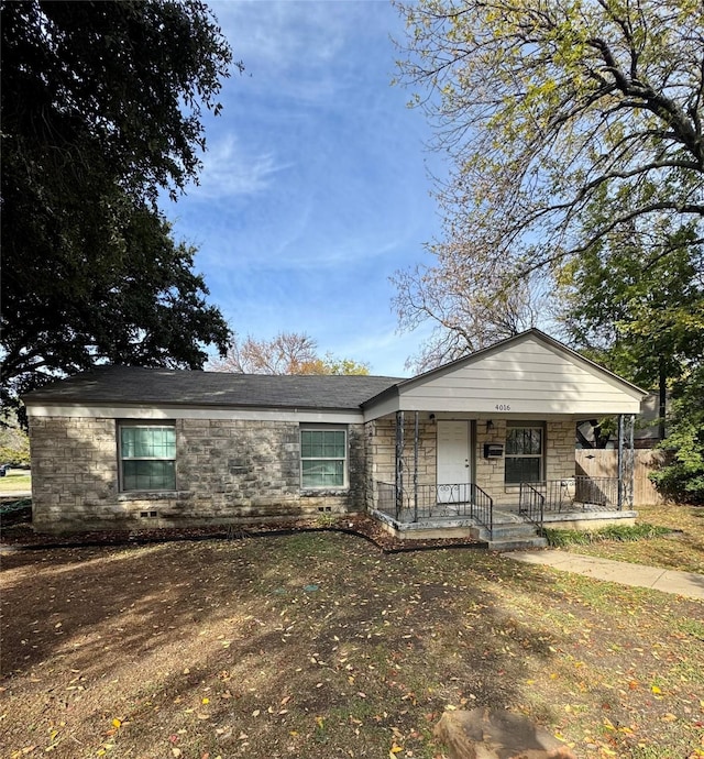 ranch-style house with covered porch