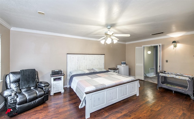 bedroom with ceiling fan, crown molding, and dark wood-type flooring