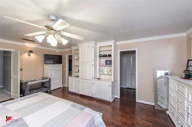 bedroom featuring dark hardwood / wood-style flooring, ornamental molding, and ceiling fan