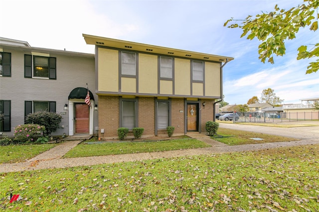 view of front of house with a front lawn