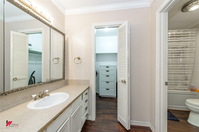 full bathroom with shower / bath combo, vanity, hardwood / wood-style flooring, and ornamental molding