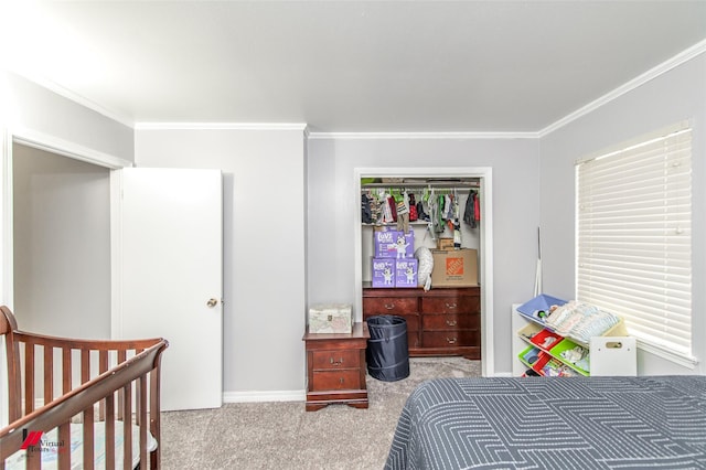 bedroom featuring light carpet, crown molding, and a closet