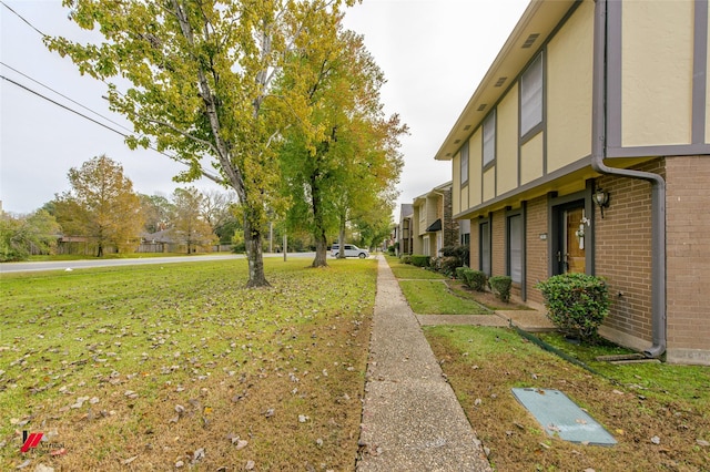 surrounding community with a lawn