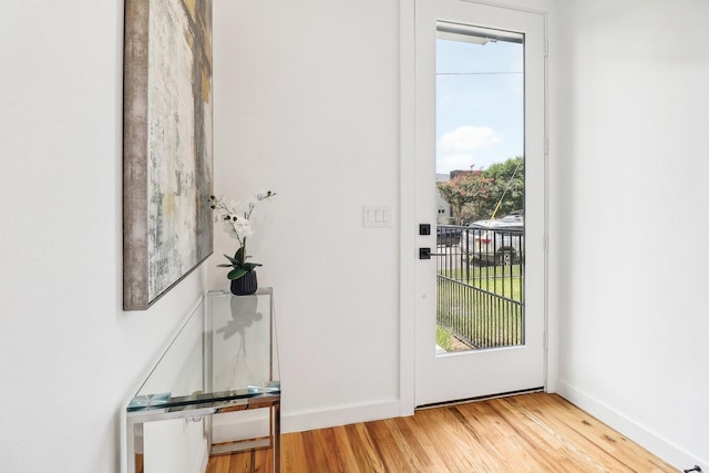 entryway with light hardwood / wood-style floors